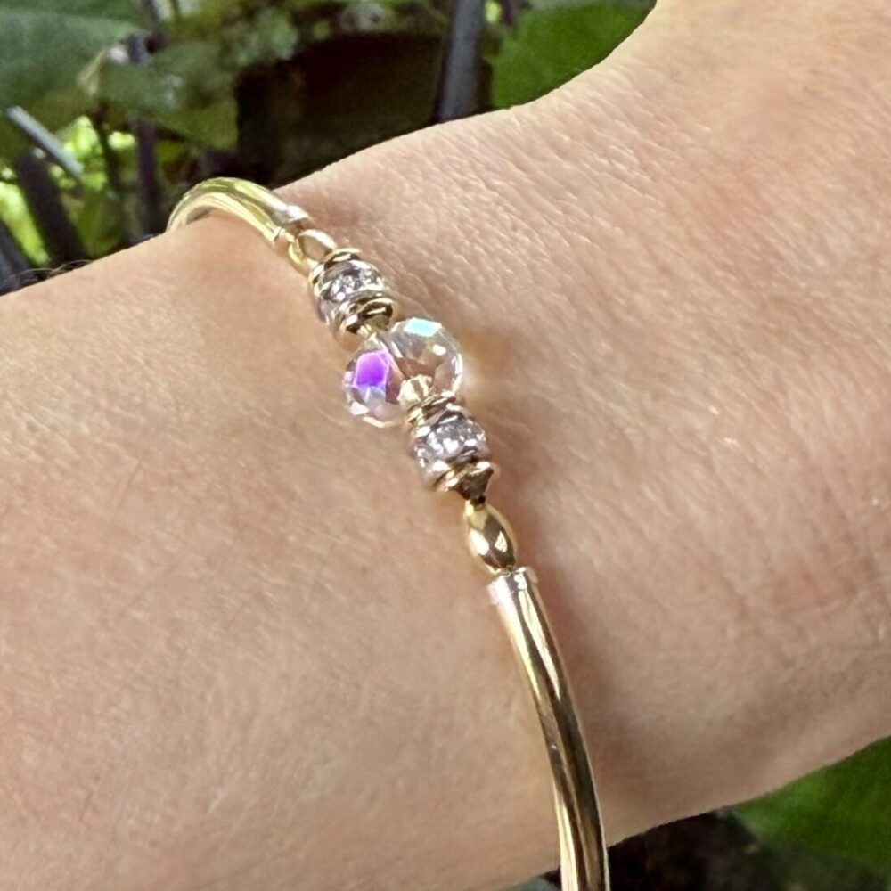 Carla Clear 14K Gold Filled Swarovski Crystal with 925 Silver Cubic Zirconia.